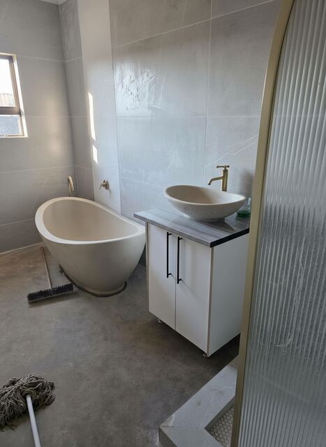 Kitchen with island and pendant lights